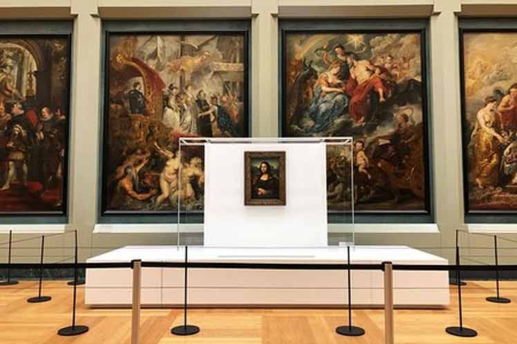 Macron anuncia sala exclusiva para "La Mona Lisa" en el Louvre mona lisa macron louvre