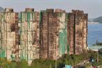 Incendio en Hong Kong deja 13 detenidos por homicidio involuntario