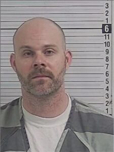 Foto policial de Philip Lee Sullivan, ex director financiero condenado por robar 1,4 millones de dólares para apostar, caso de ludopatía en Florida